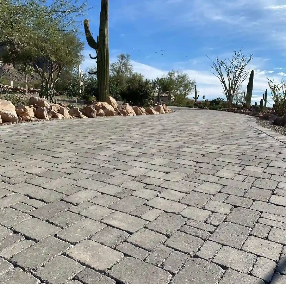 A paver-style walkway through a Phoenix neighborhood