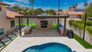 Best Shade Structures for Arizona Backyards A recently built pergola, fire place, pool, and pool decking built in Arizona